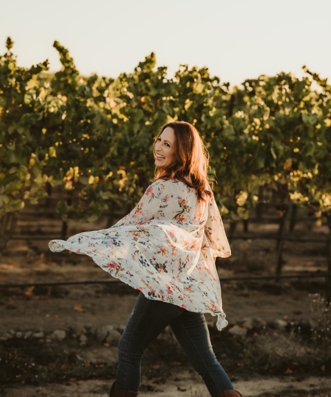 international women's day Heather Piazza twirling in the vineyards